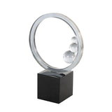 Modern Clear Crystal Ring Sculpture with Glass Spheres & Black Base