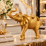 Gold Resin Elephant Walking Decorative Sculpture with Floral Accents