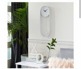 Oval White Metal Pendulum Wall Clock